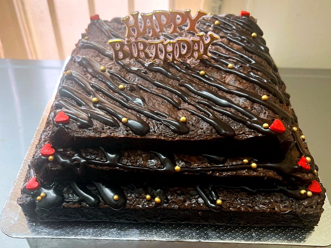 Tiered brownie celebration cake made for a private party