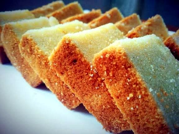 Golden tea cake slices arranged in a row